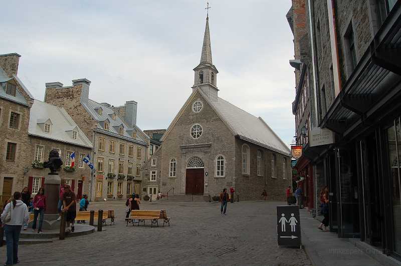 Canada East Tour 2006109.JPG - Bishop Laval's chapel was rededicated in 1690 as glise Notre-Dame-des-Victoires when 34 British ships withdrew after a five-day siege of the city. "Victory" singular became "victories" plural in 1711 after a British naval attack was disrupted by a violent storm. When the British came a third time, in 1759, they stayed, and the church was almost completely destroyed by their bombardment.